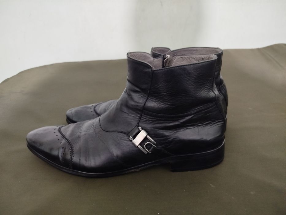 Продам фирменные сапоги.