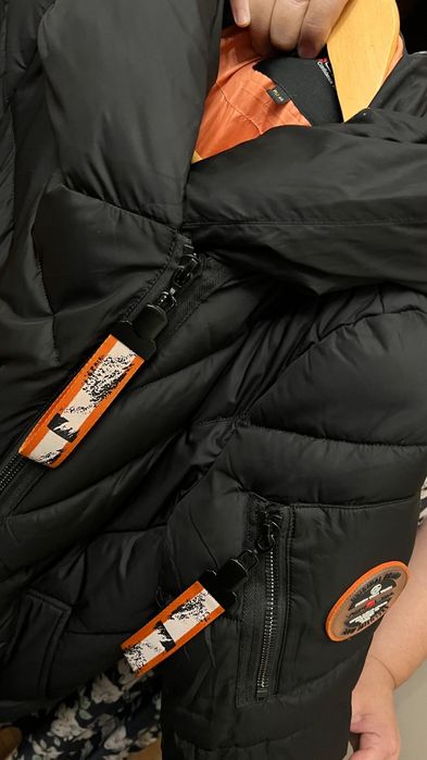 Продам  пуховик б/у