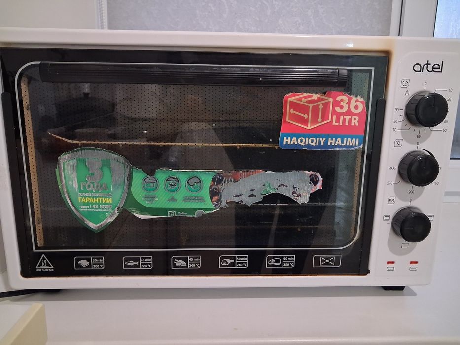 Продам б/у духовку
