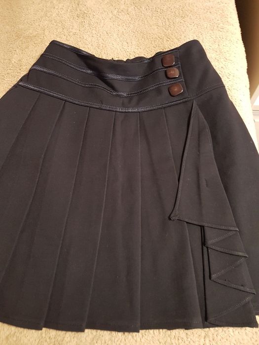 Продам школьные  юбку рубашки на 11 лет Турция