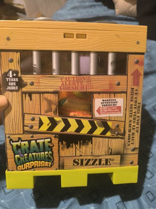 Jucarie interactiva Crate Creatures - Sizzle+Gratuit Pistol  NERF