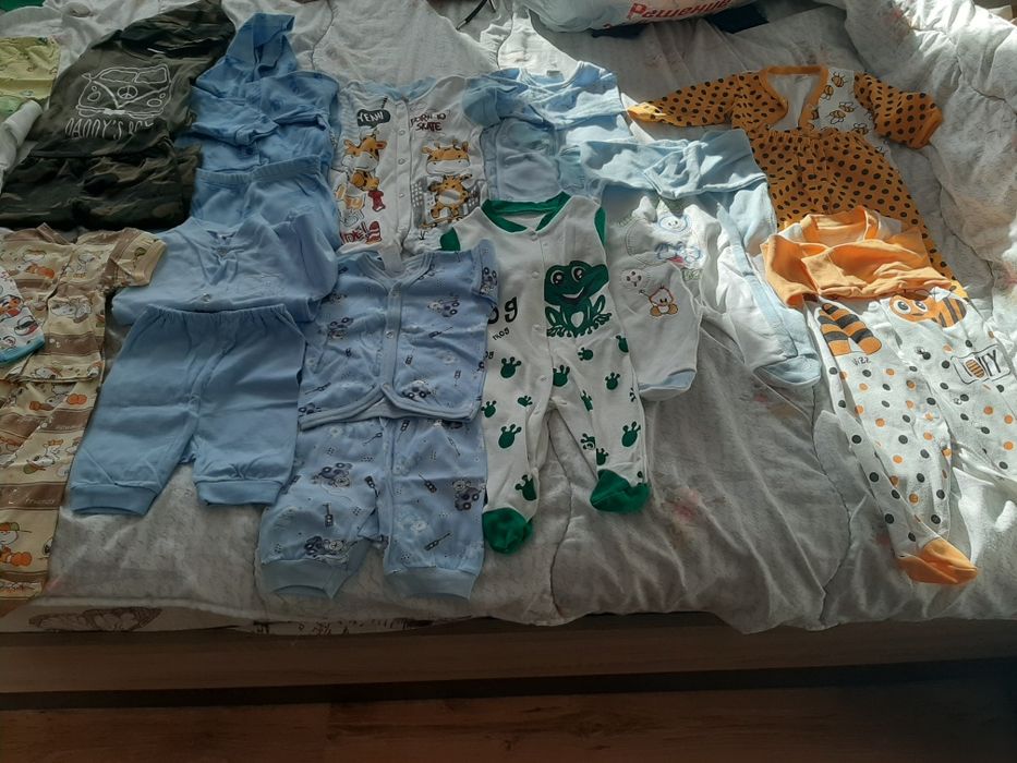 Дрехи за новородено