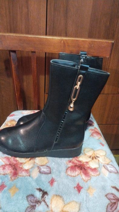 Женские сапоги..