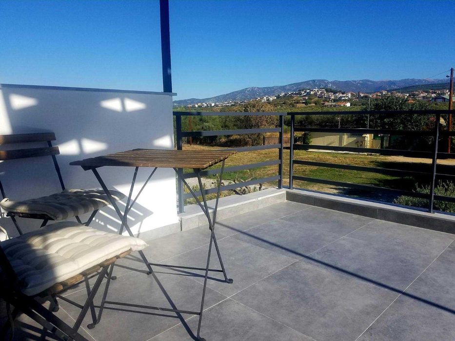 Продава нова лукс къща 72 м2 двор 557 м2 в Паралия Каряни, Гърция