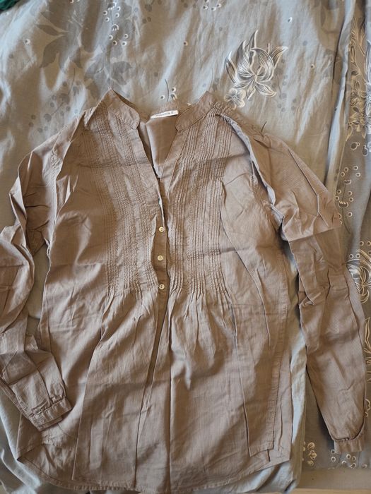 Подарявам дрехи.