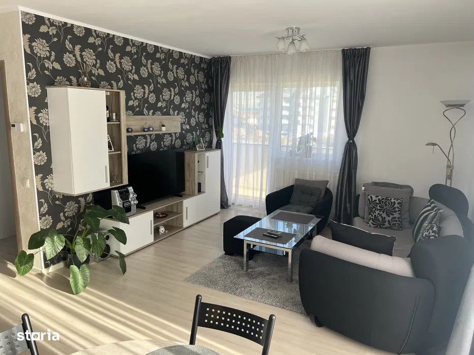 Apartament cu 2 camere,terasa,parcare inclusa,etaj intermediar