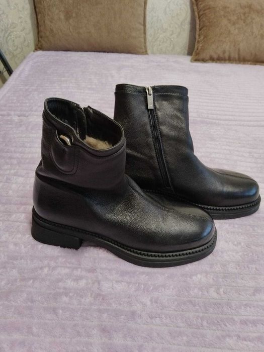 Продам новые сапоги