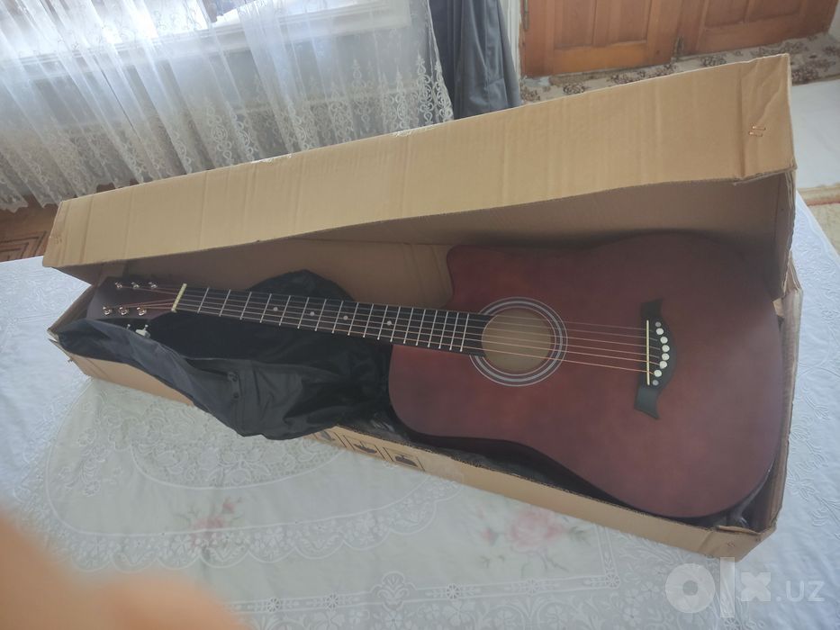 Clasic gitara yangi 2 3 marta ishlatilgan holos xolati chotki