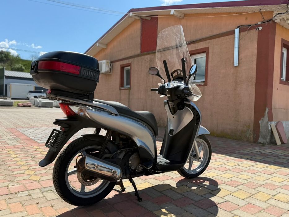 Honda sh 125i 2009 acte Germania se conduce cu categoria B
