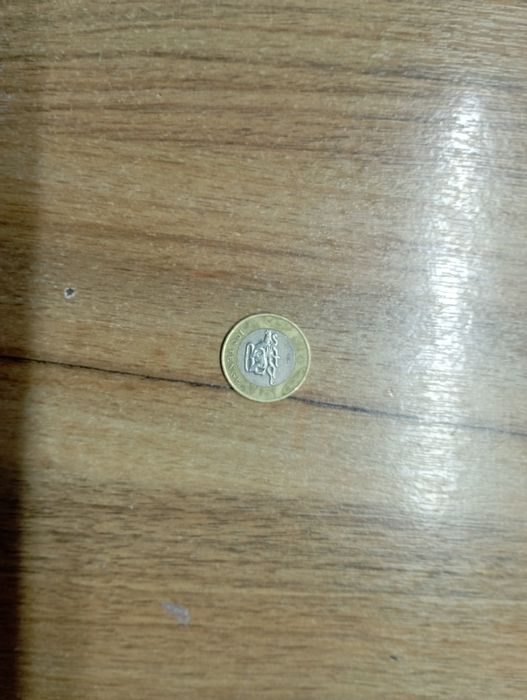 Продам монету 100 тенге