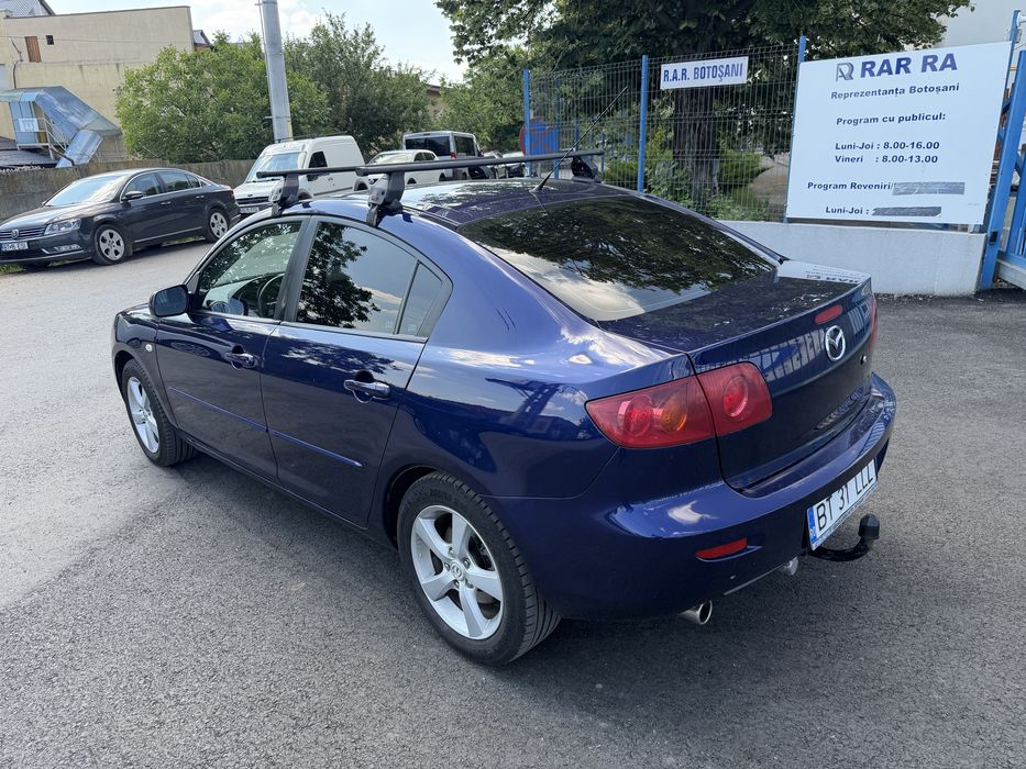 Mazda 3, Limuzină