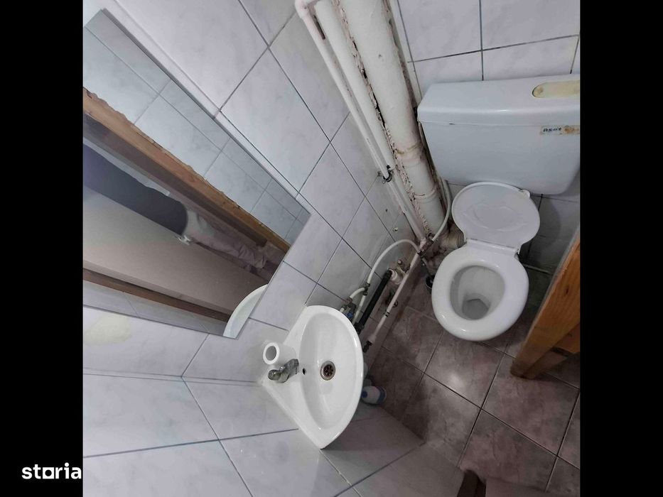 Cameră de cămin cu baie proprie