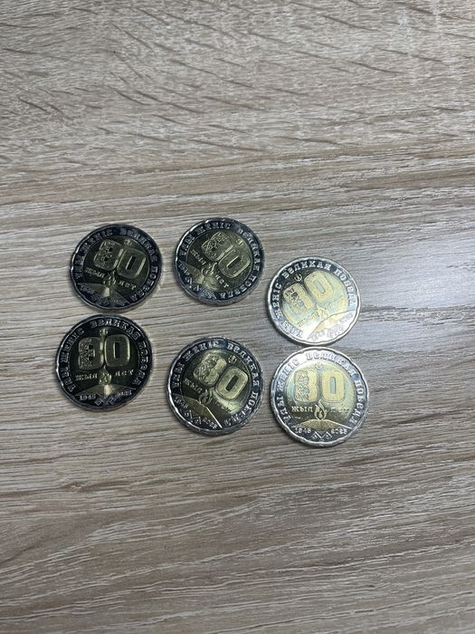 Монета 100 тенге