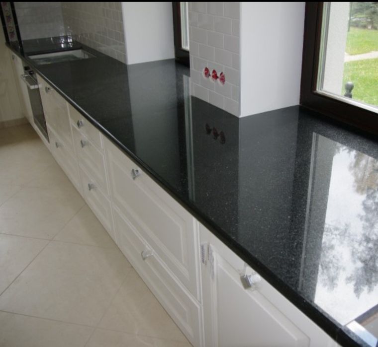 Столешница из искусственного камня  и корпусная мебель,кухни