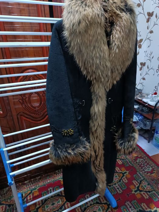 Palto yangi kiyilmagan