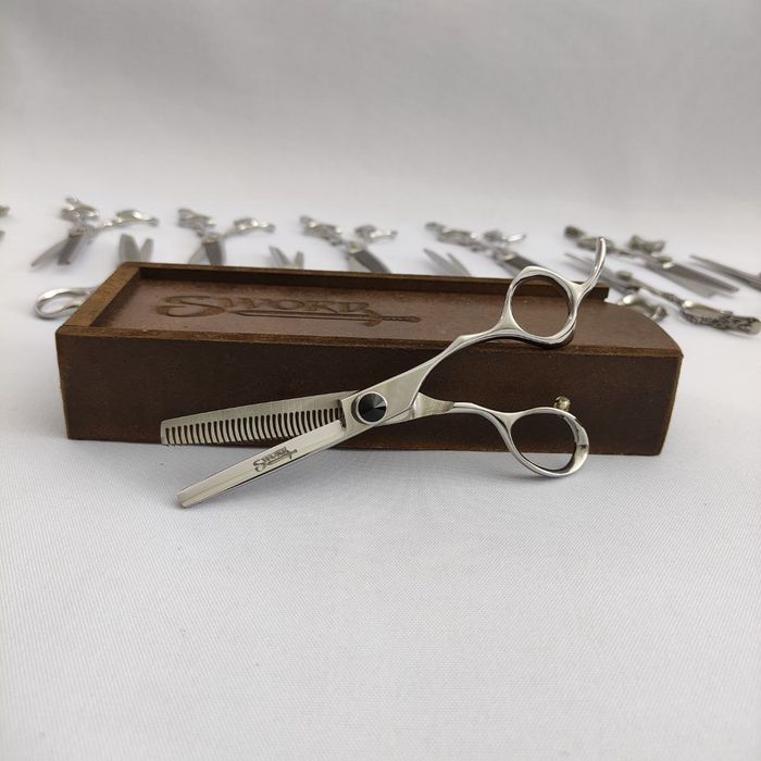 Qaychi kesuvchi va siyraklashtiruvchi (filirovka)