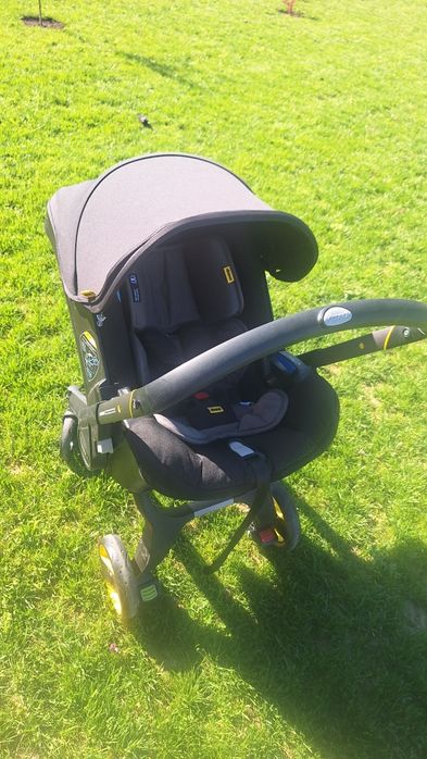 Scaun auto și cărucior Doona