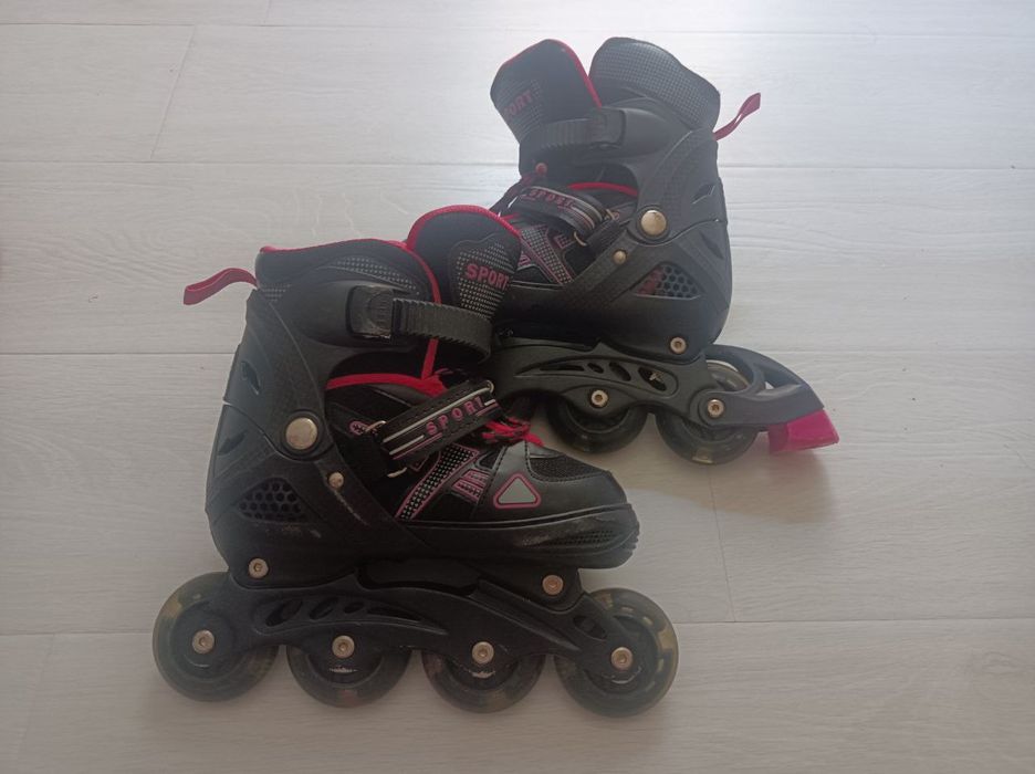 Роликовые коньки, детские, розовые.