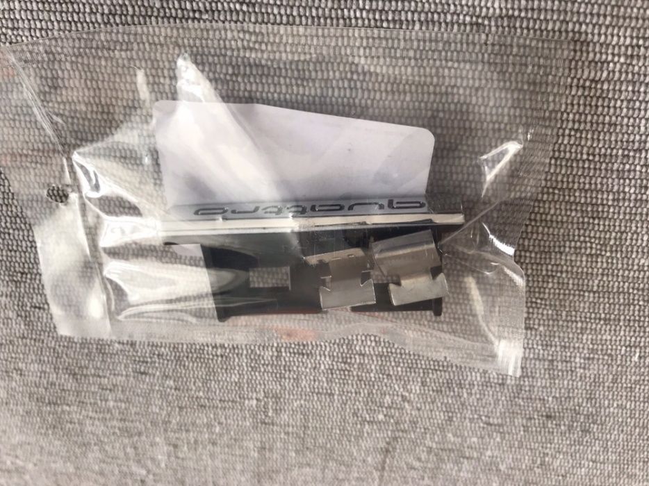 Emblema Audi Quattro grila