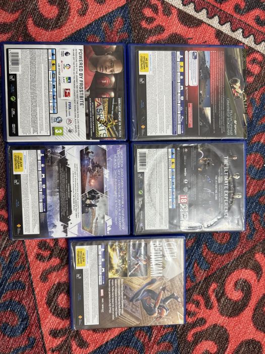 PlayStation диски и подставка