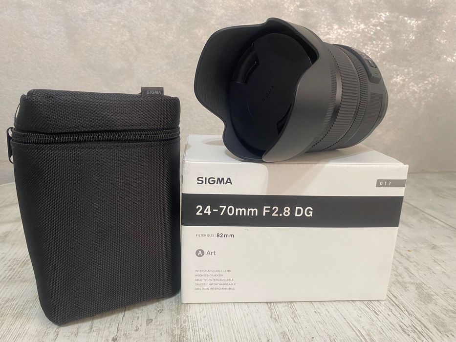 Vând obiectiv Sigma 24–70mm f/2.8 DG Art, montura EF, în garanție
