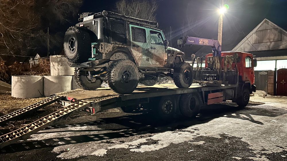 Грузовой эвакуатор-манипулятор