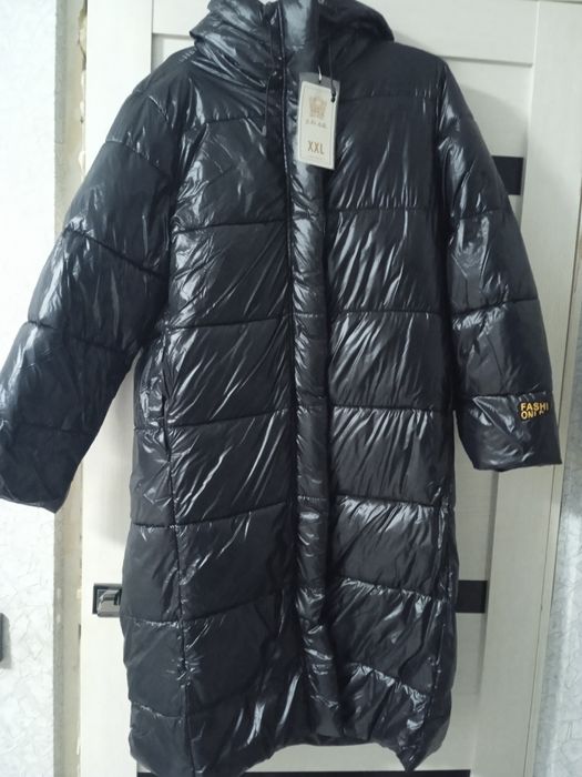 новый пуховик продам