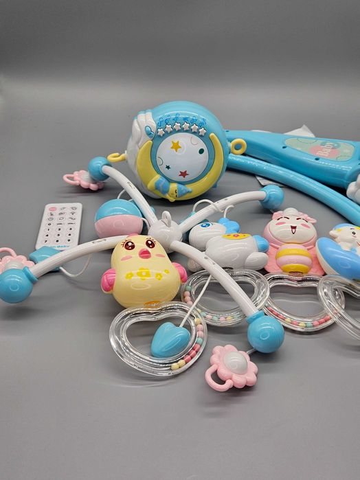 Бебешка музикална въртележка за кошара с прожектор,светлини и дистанц.