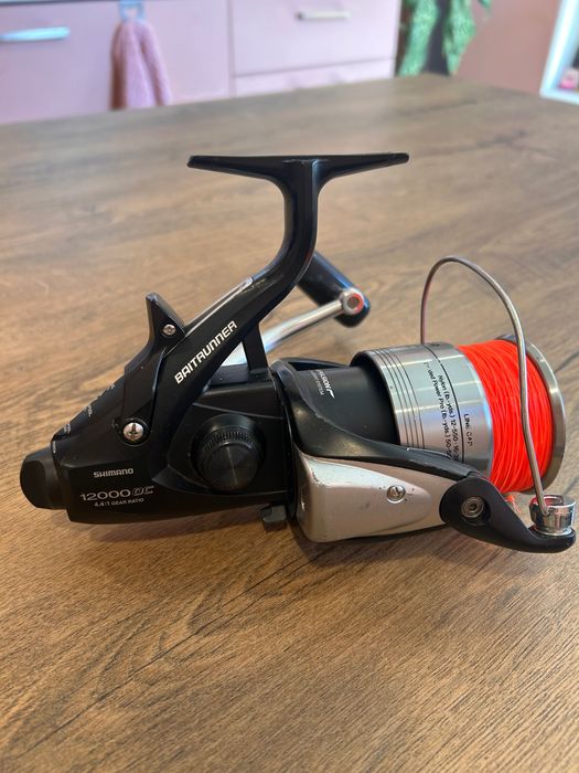 Макара shimano baitrunner 12000 oc