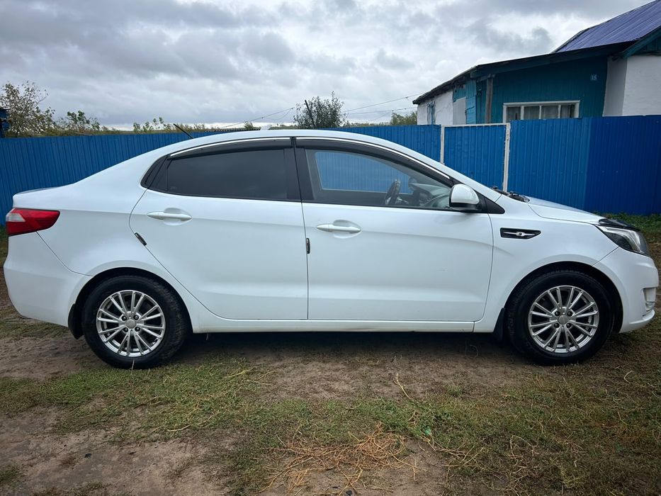 Kia Rio 2014 года