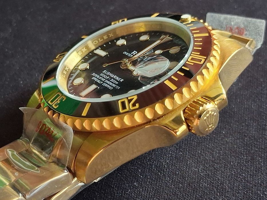 Rolex  Submariner, Day-Date Gold