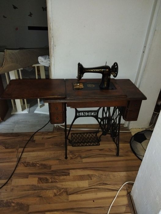 Mașină de cusut Singer