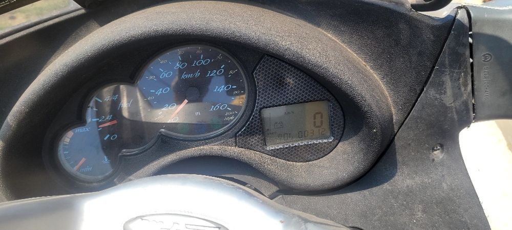 Vand sau schimb malaguti madison 250 cc