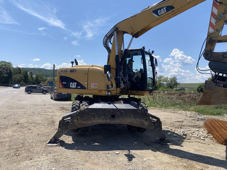 Excavator pneuri Cat 313 D
