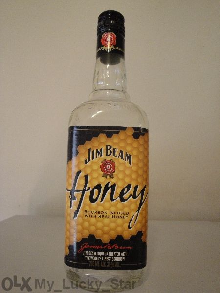 Празна колекционерска бутилка / шише и кутия от уиски Jim Beam Honey