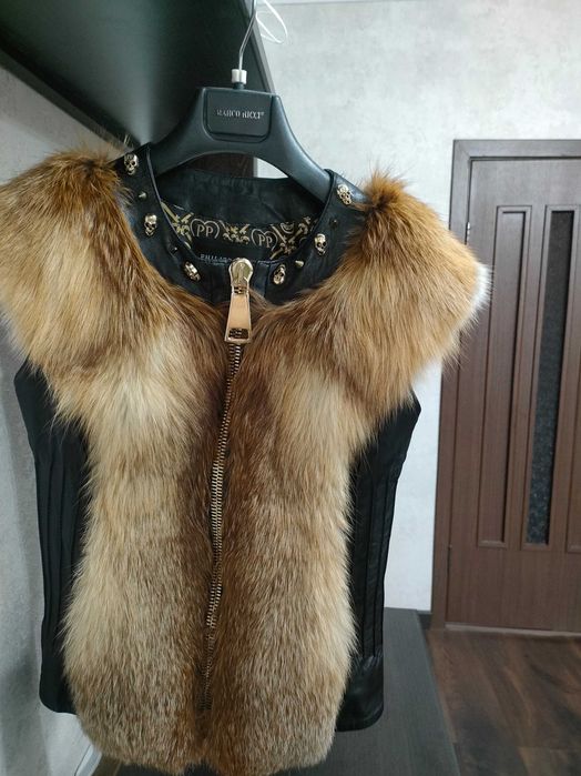 Продам кожаную жилетку