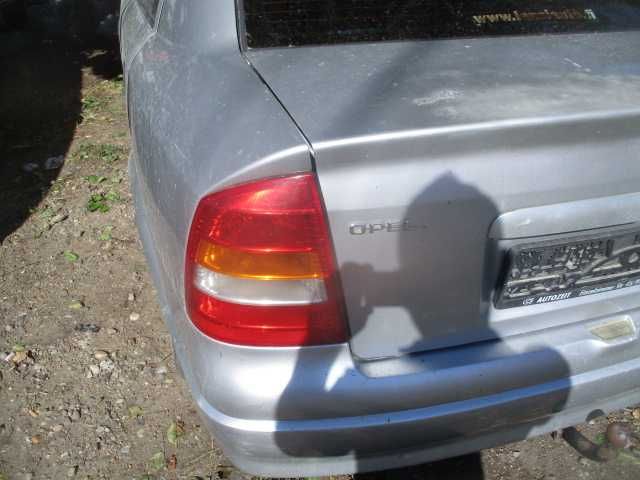 Tripla stop stanga dreapta OPEL ASTRA G sedan scurt si BERTONE