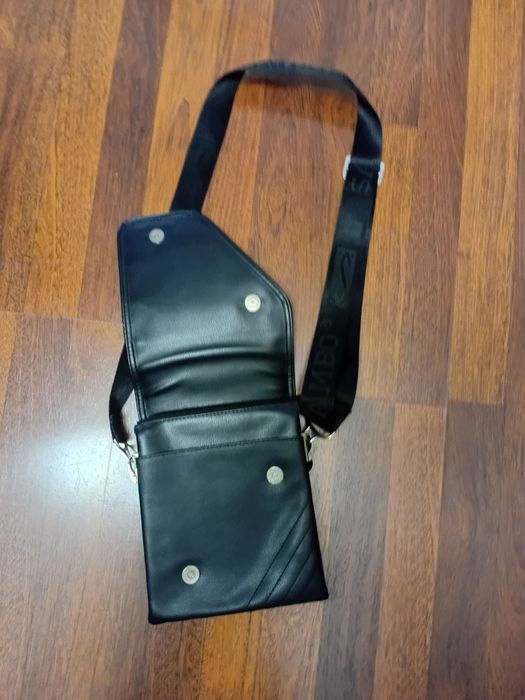 Продам стильную сумку планшет бренда Sambo.