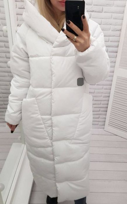 Продам новые женский пуховик