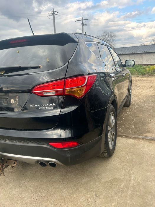 Aripă stânga spate Hyundai Santa Fe 2014