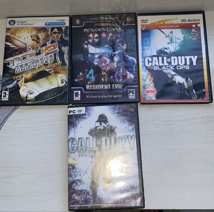 CD/DVD диски с играми и фильмами