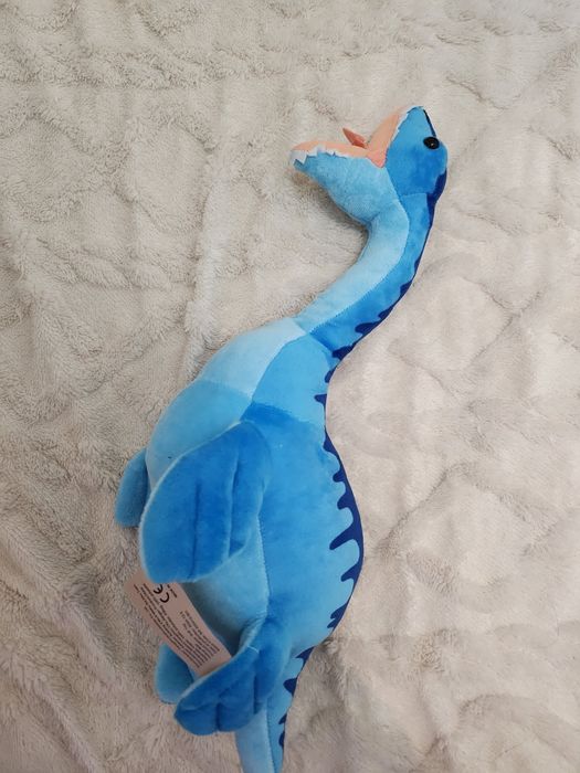 Динозавр игрушка