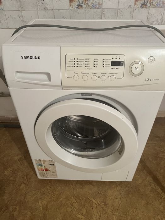 Продам стилаьную машину 5 кг