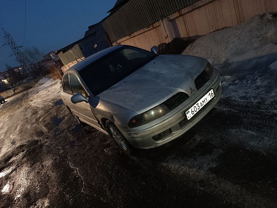 Митсубиси кариссм. В полный разбор