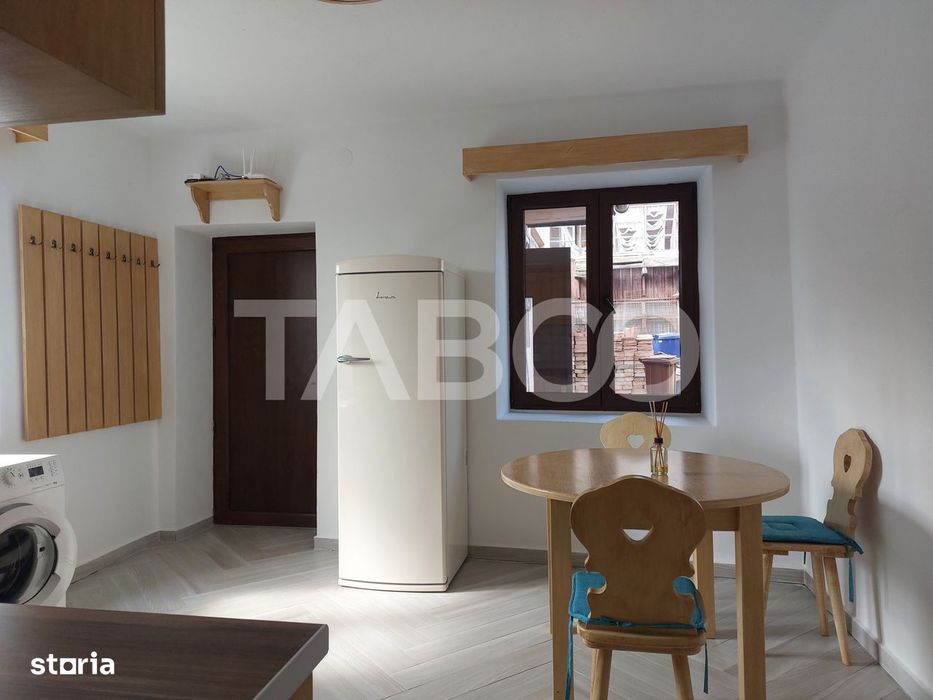 Casa 58 mp cu gradina 300 mp pet friendly central Cisnadioara
