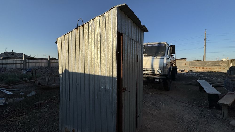 Продам землю с постройкой