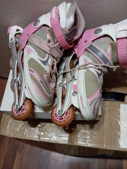 Роликовые коньки