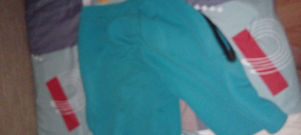 Pantaloni nike tech turcoaz