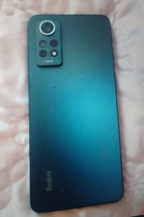 Продам  телефон .