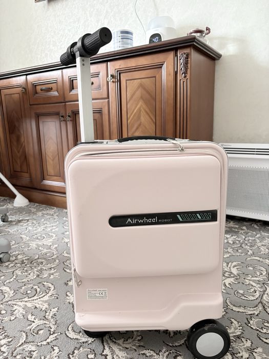 Чемодан-самокат электрический